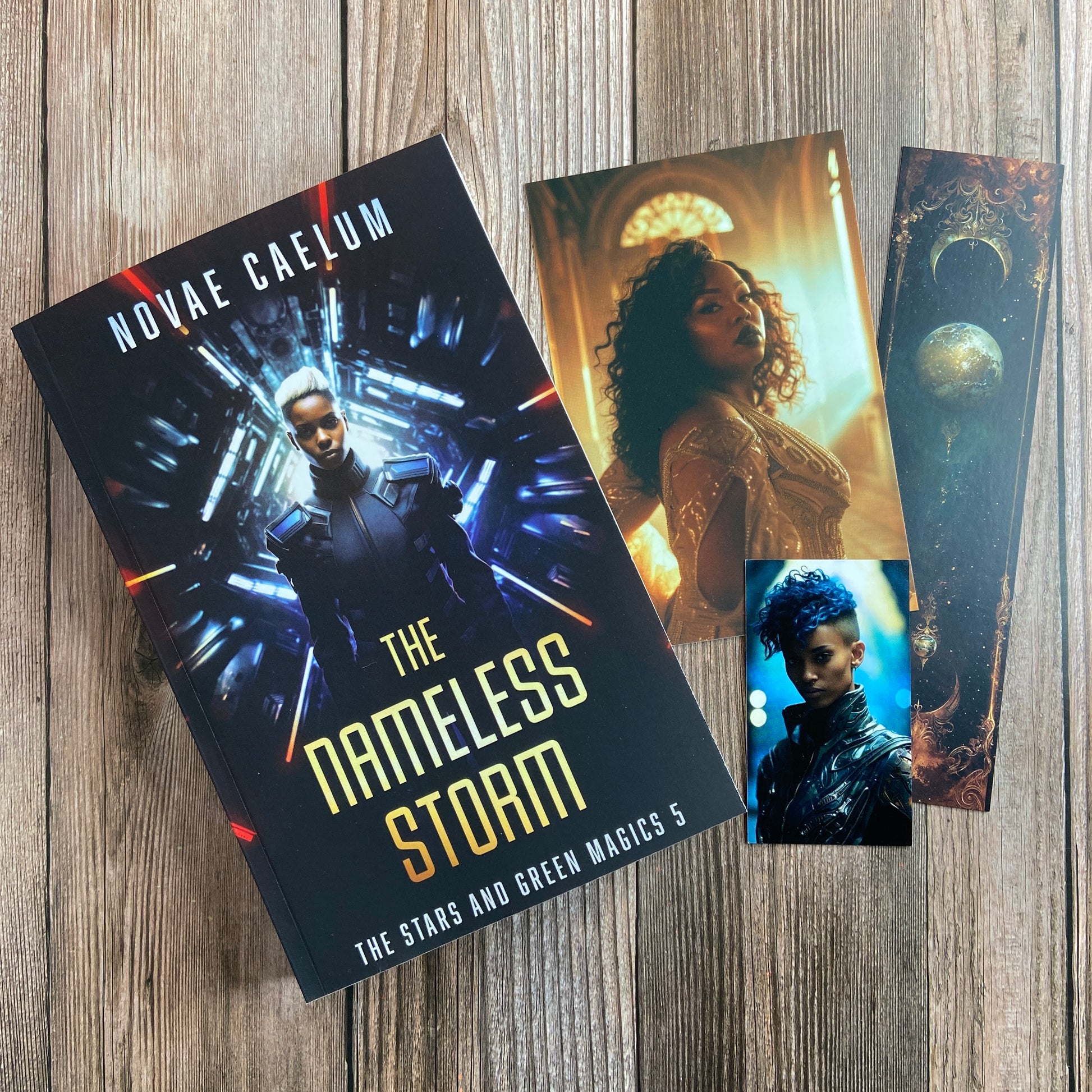 A paperback titled "The Nameless Storm: The Stars and Green Magics -  Book 5" by Novae Caelum, featuring a cover image of a nonbinary individual in futuristic armor standing before a tunnel of glowing lights in the background; there are also 3 series-related swag pieces arranged beside the book.