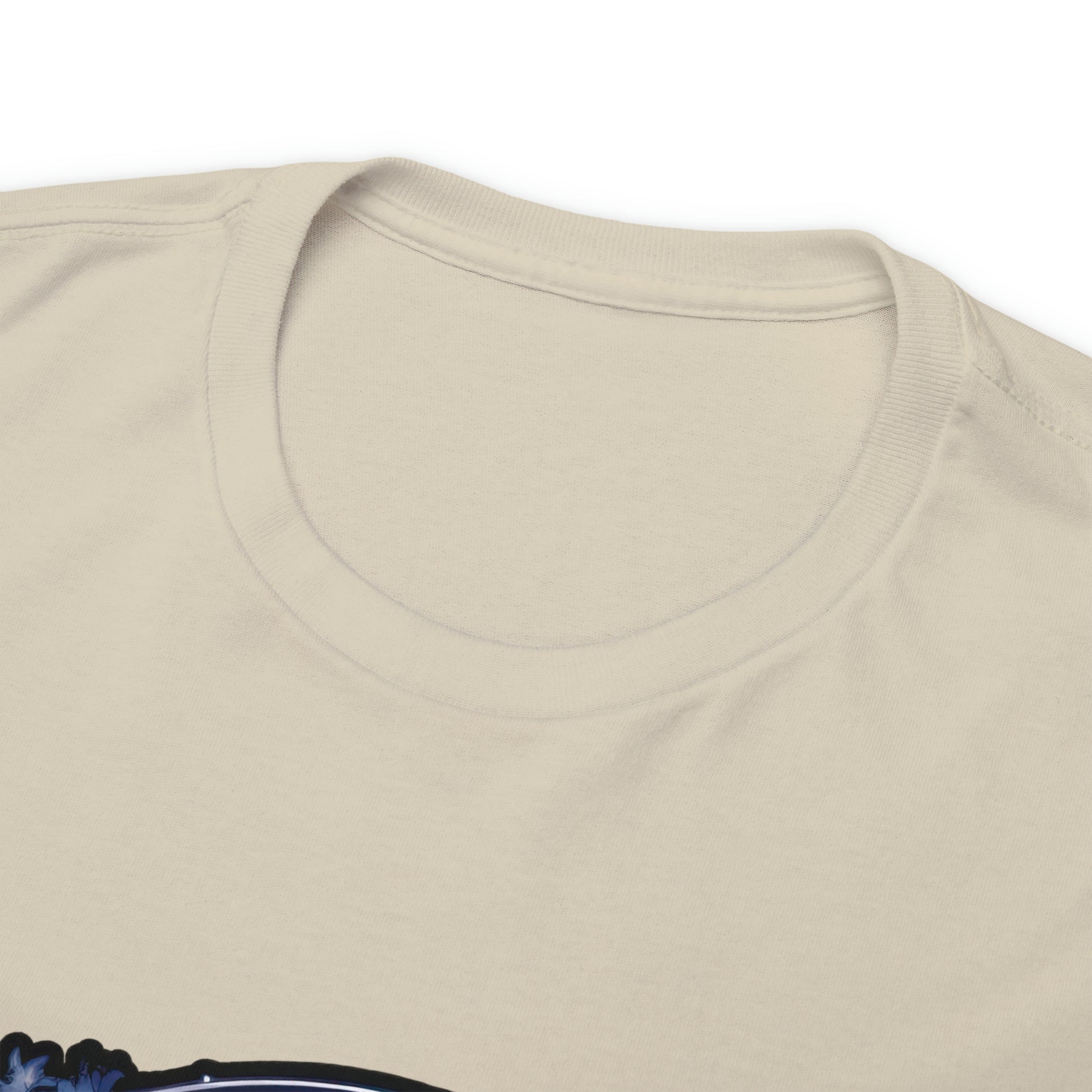 Close-up of the tagless collar of a sand-colored t-shirt; the shirt image (not pictured) displays a psychedelic cat in the Transgender Pride flag colors.