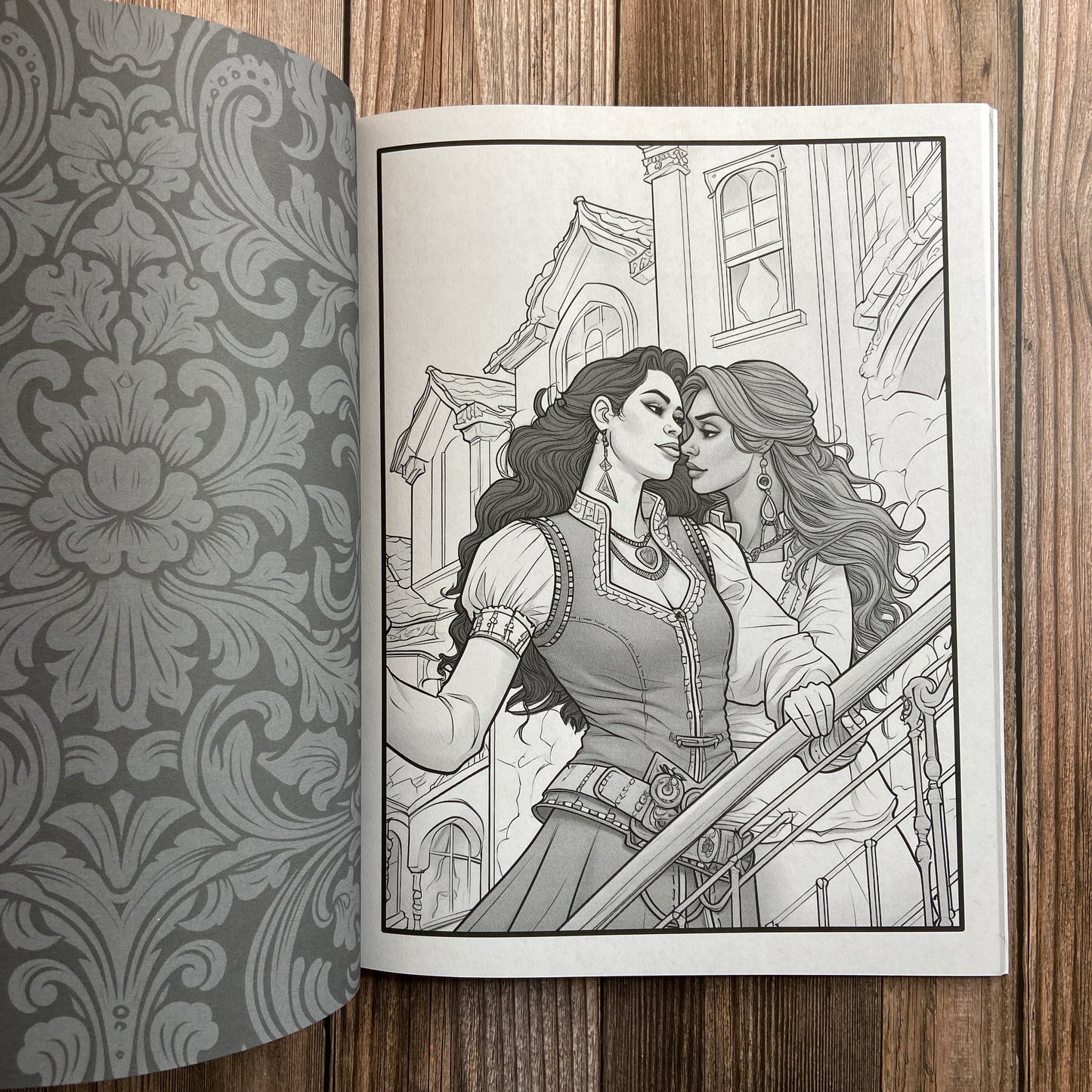 A N.C. Starshadow Sapphic Pirate coloring book with two women on the cover.