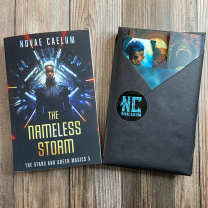 A science fiction book titled 'SIGNED The Nameless Storm: The Stars and Green Magics Book 5' by Novae Caelum alongside origami-wrapped packaging with the same branding logo.