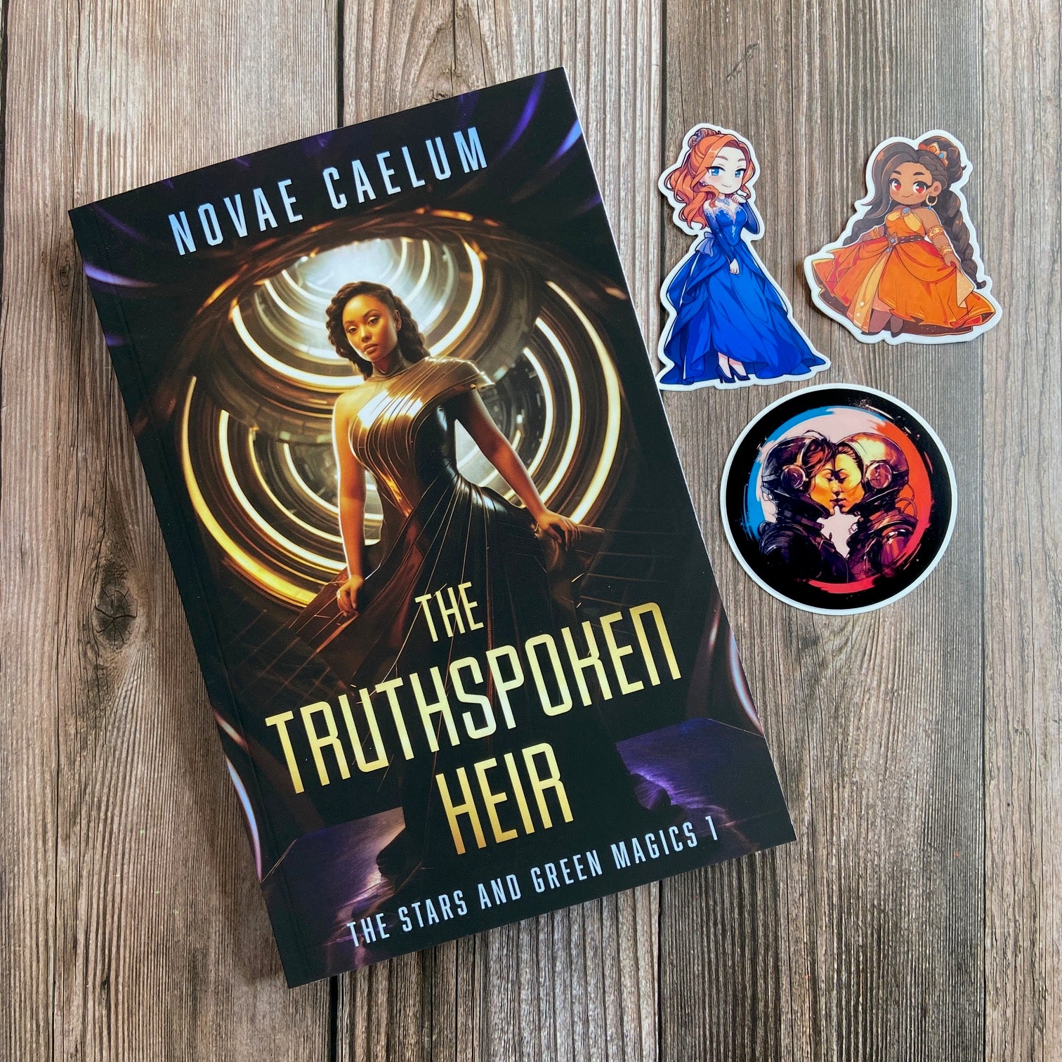 A book titled "SCRATCH AND DENT - SIGNED The Truthspoken Heir: The Stars and Green Magics Book 1" by Novae Caelum, displayed on a wooden surface with accompanying stickers featuring characters with shapeshifting powers.