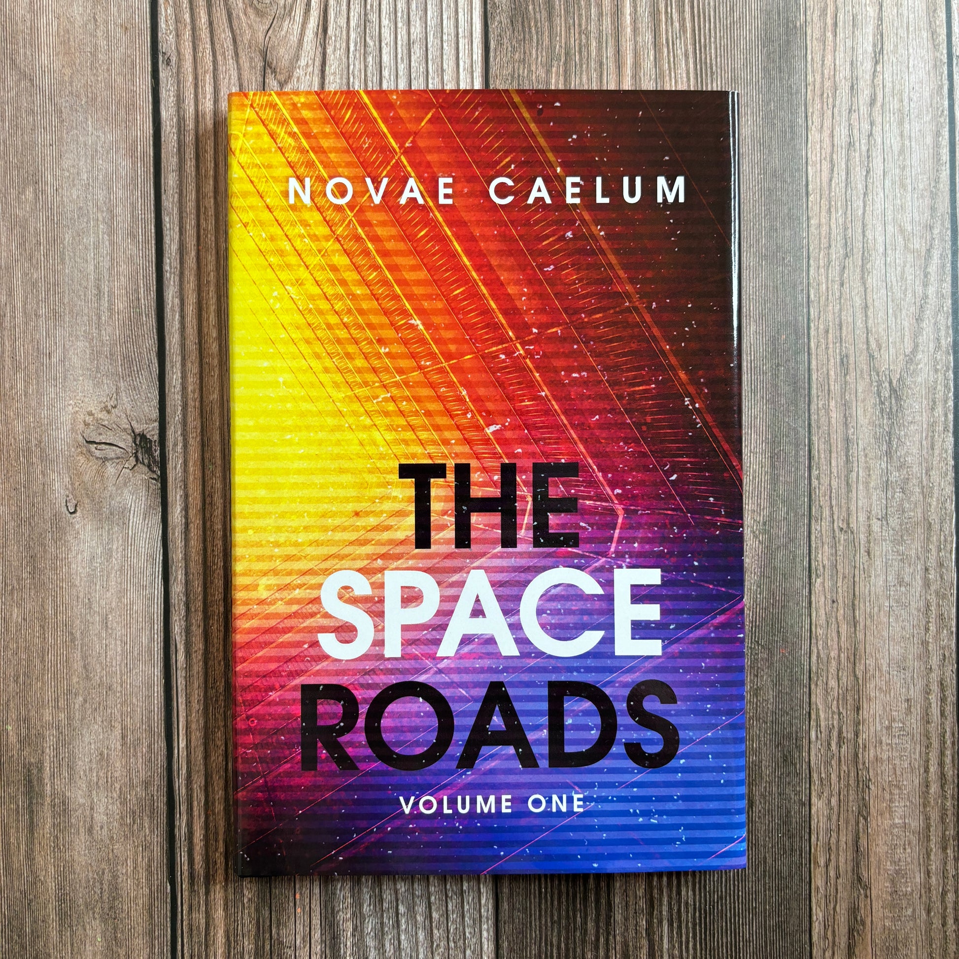 Cover visible for paperback "The Space Roads" by Novae Caelum.